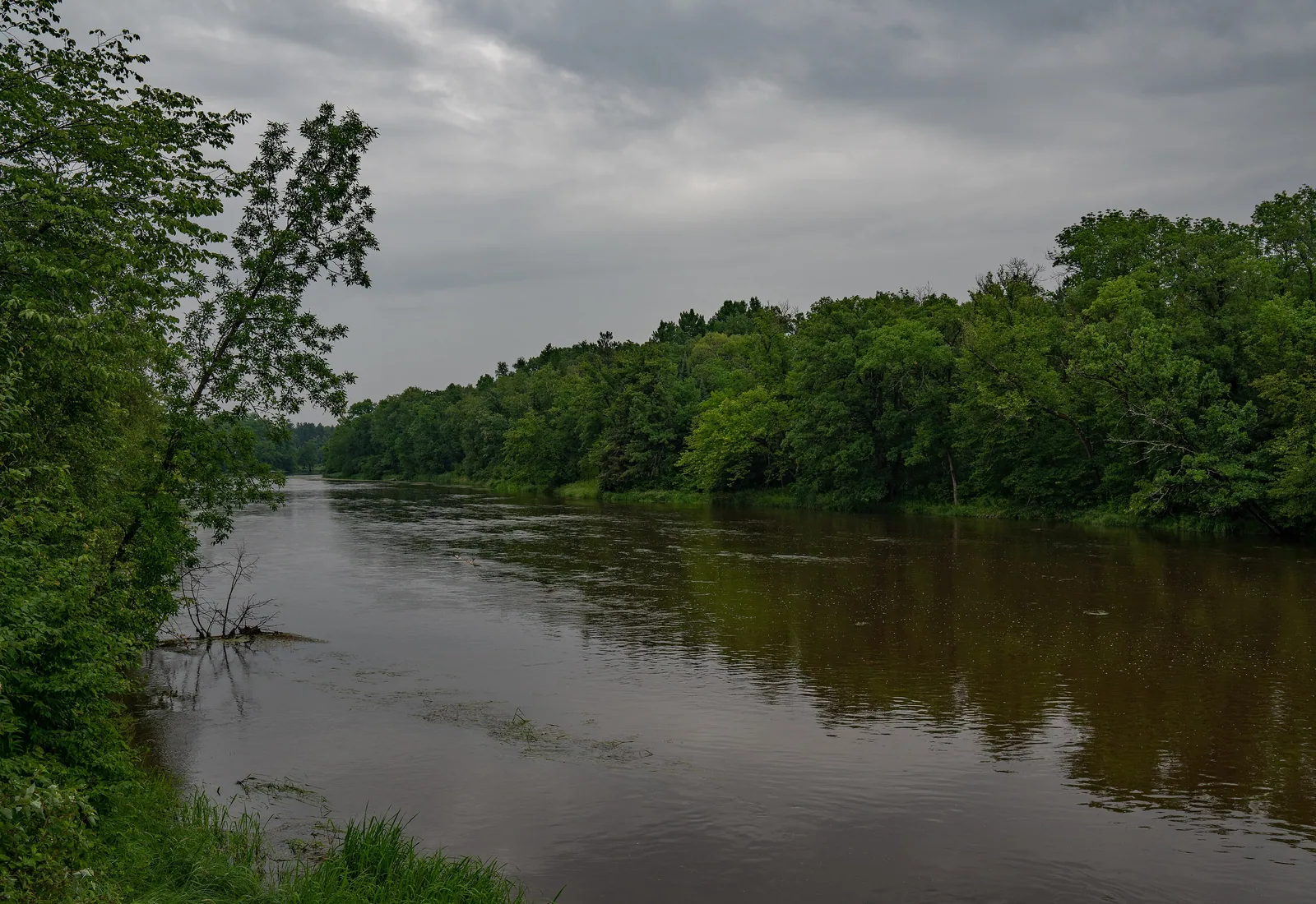 The Crow Wing River curves between forested banks near Oylen, Minnesota.