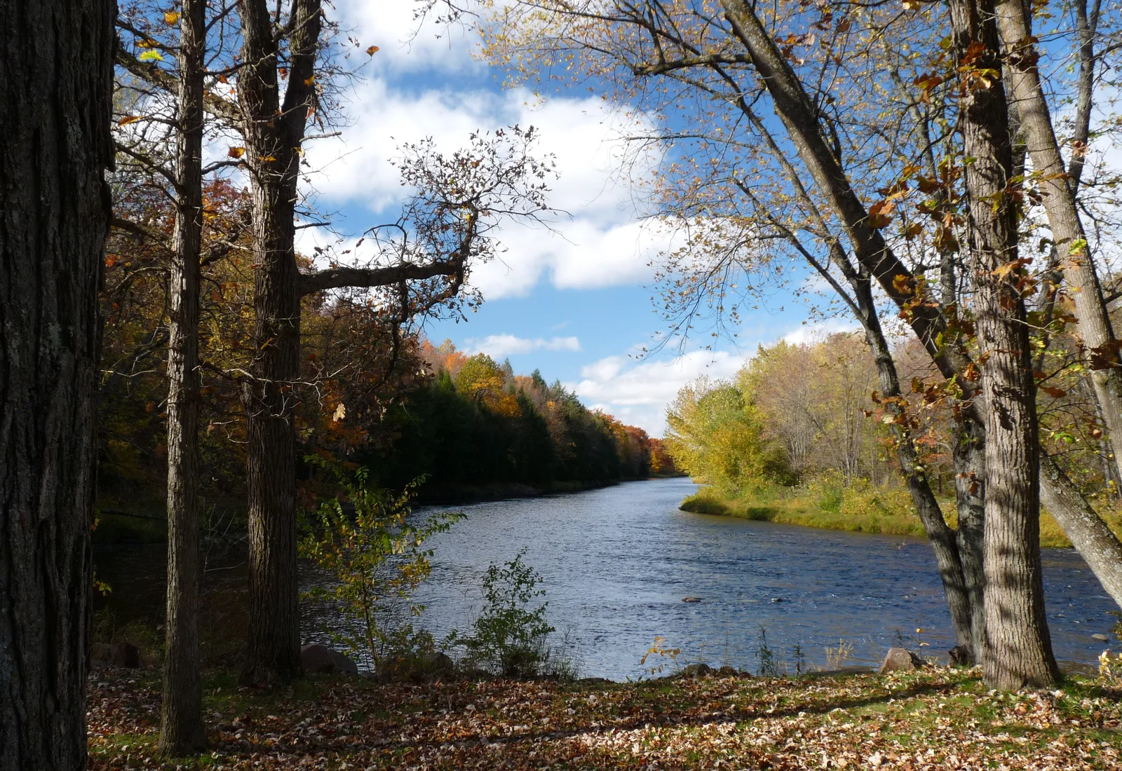 The Jump River flows downstream from the wayside at Jump River, Wisconsin.