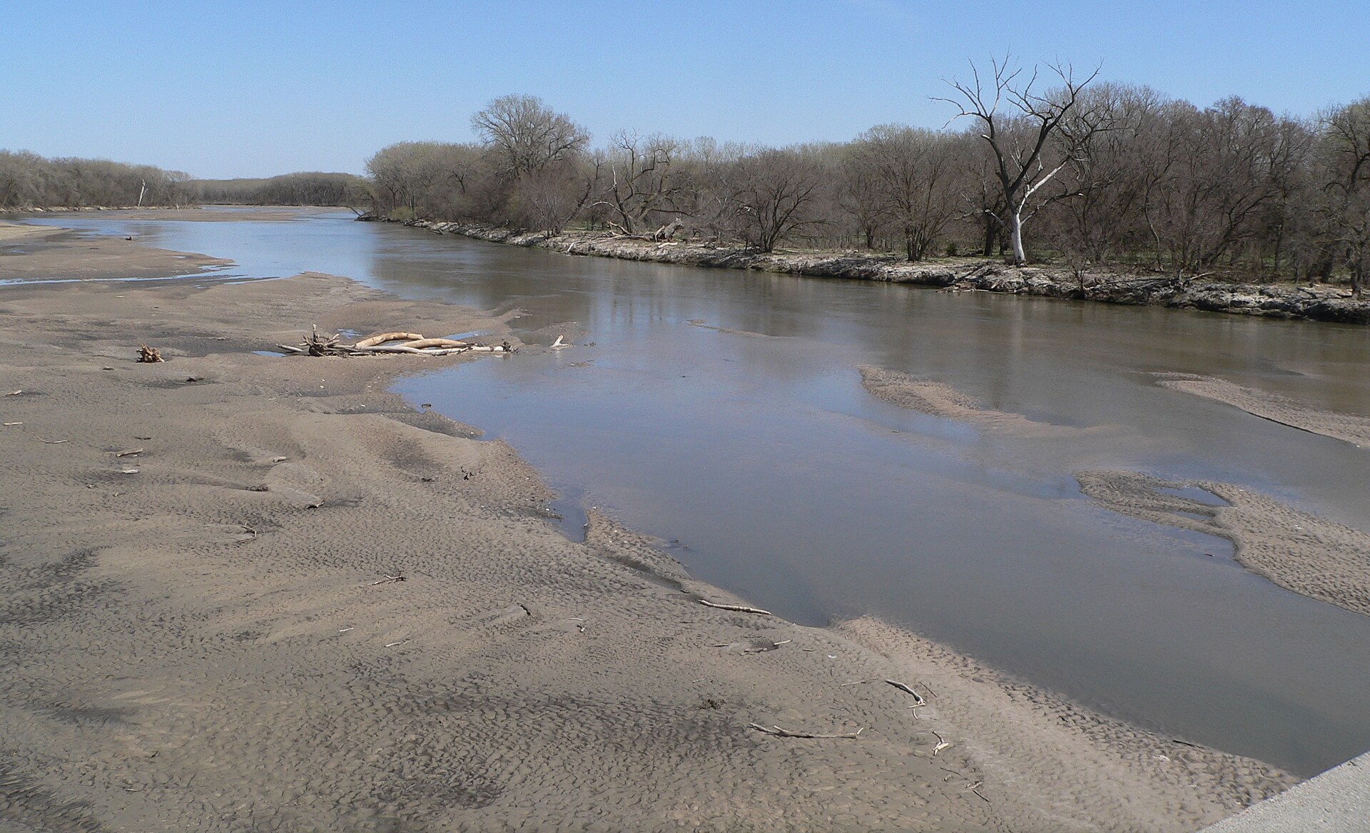 The Loup River flows downstream beneath Nebraska Highway 39 south of Genoa, Nebraska.