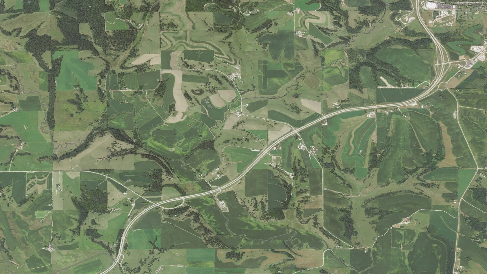 Aerial orthoimagery shows the Mineral Point Branch Pecatonica River corridor near Ludden Lake, Wisconsin.