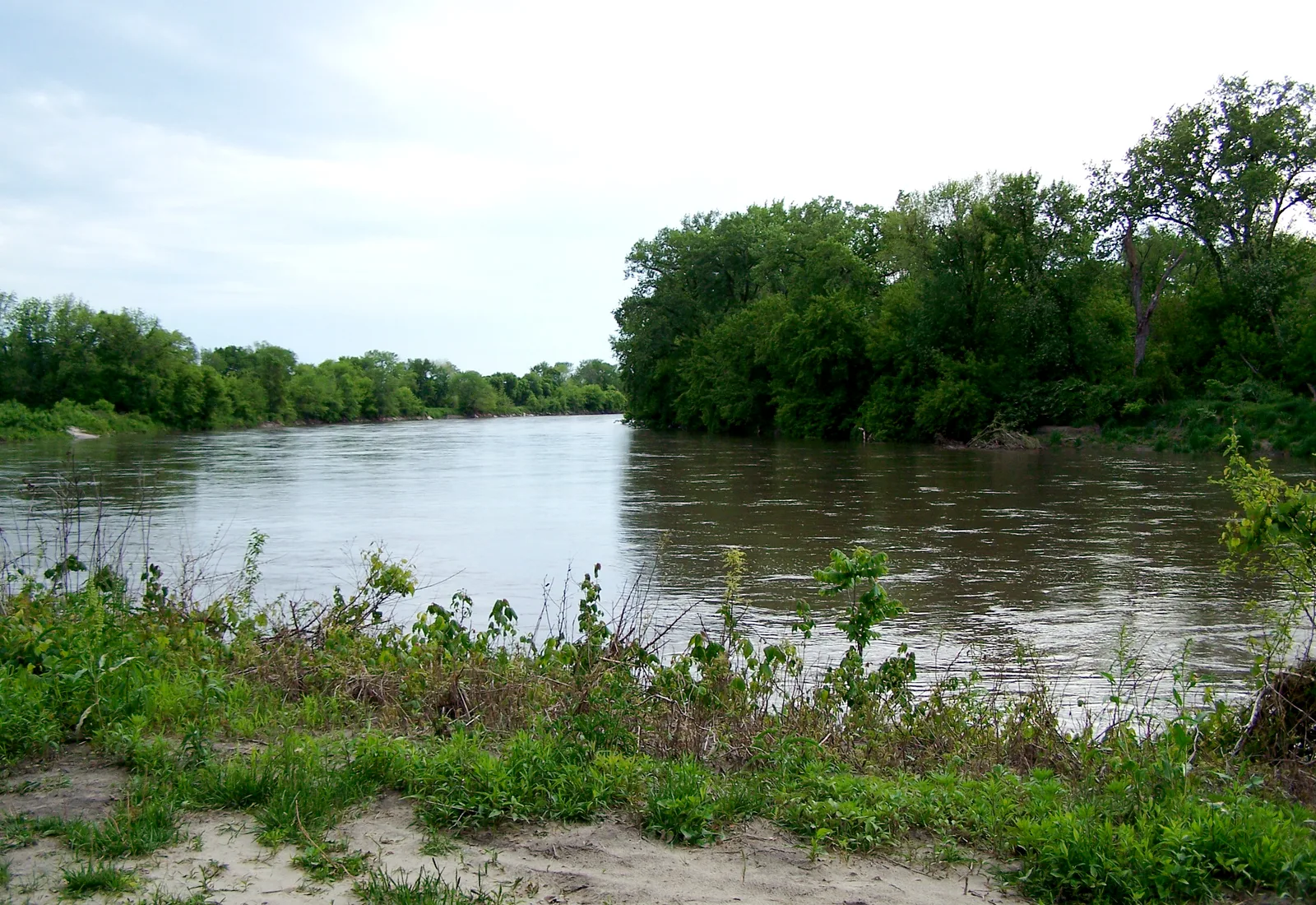 The Raccoon River flows past Walnut Woods State Park in West Des Moines, Iowa.